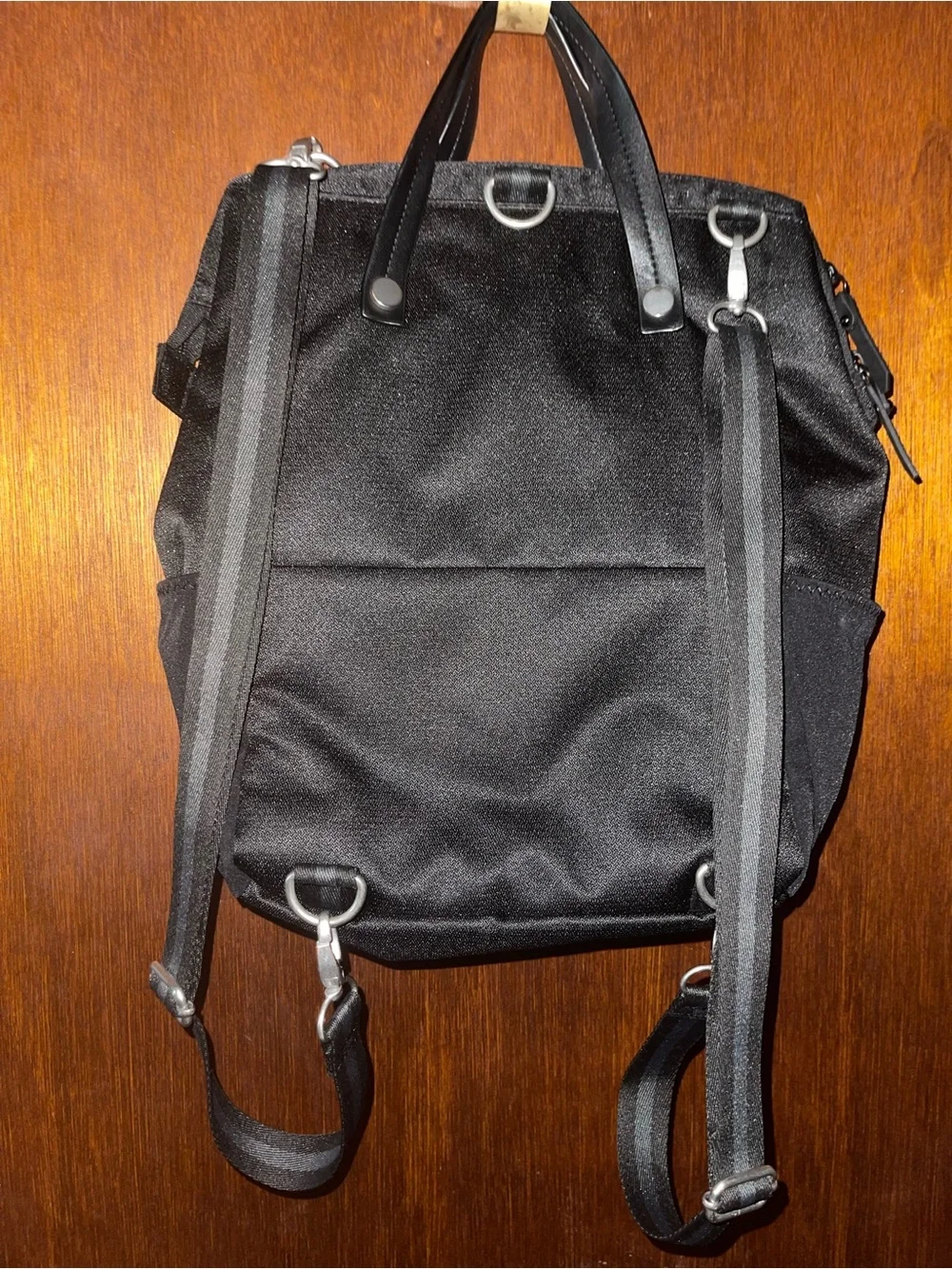 Sherpani Black Backpack with Orange Accent